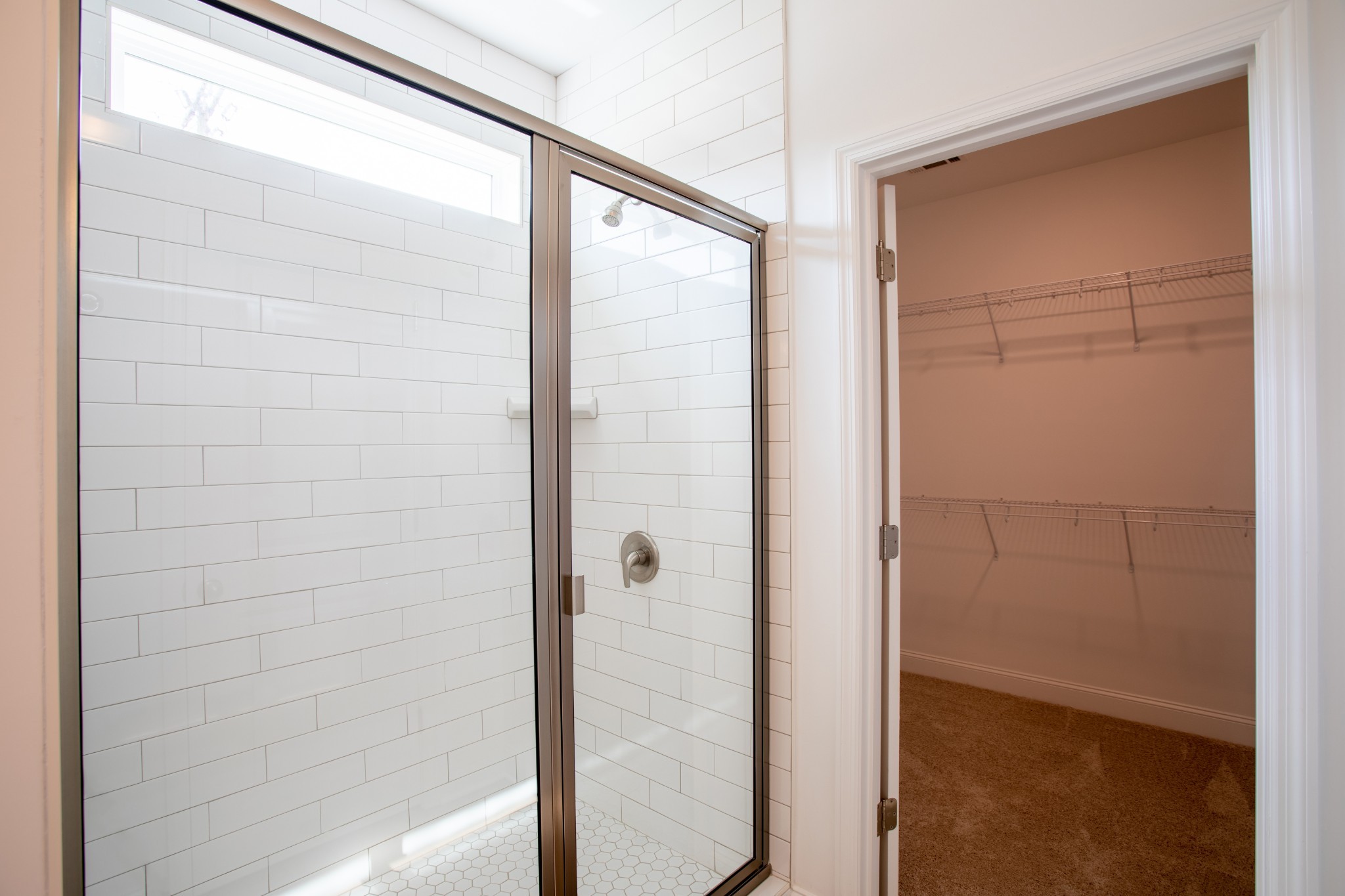 4885 Dyno Loop Chattanooga, TN 37415 - Photo 13 of 17 a bathroom with a glass shower door