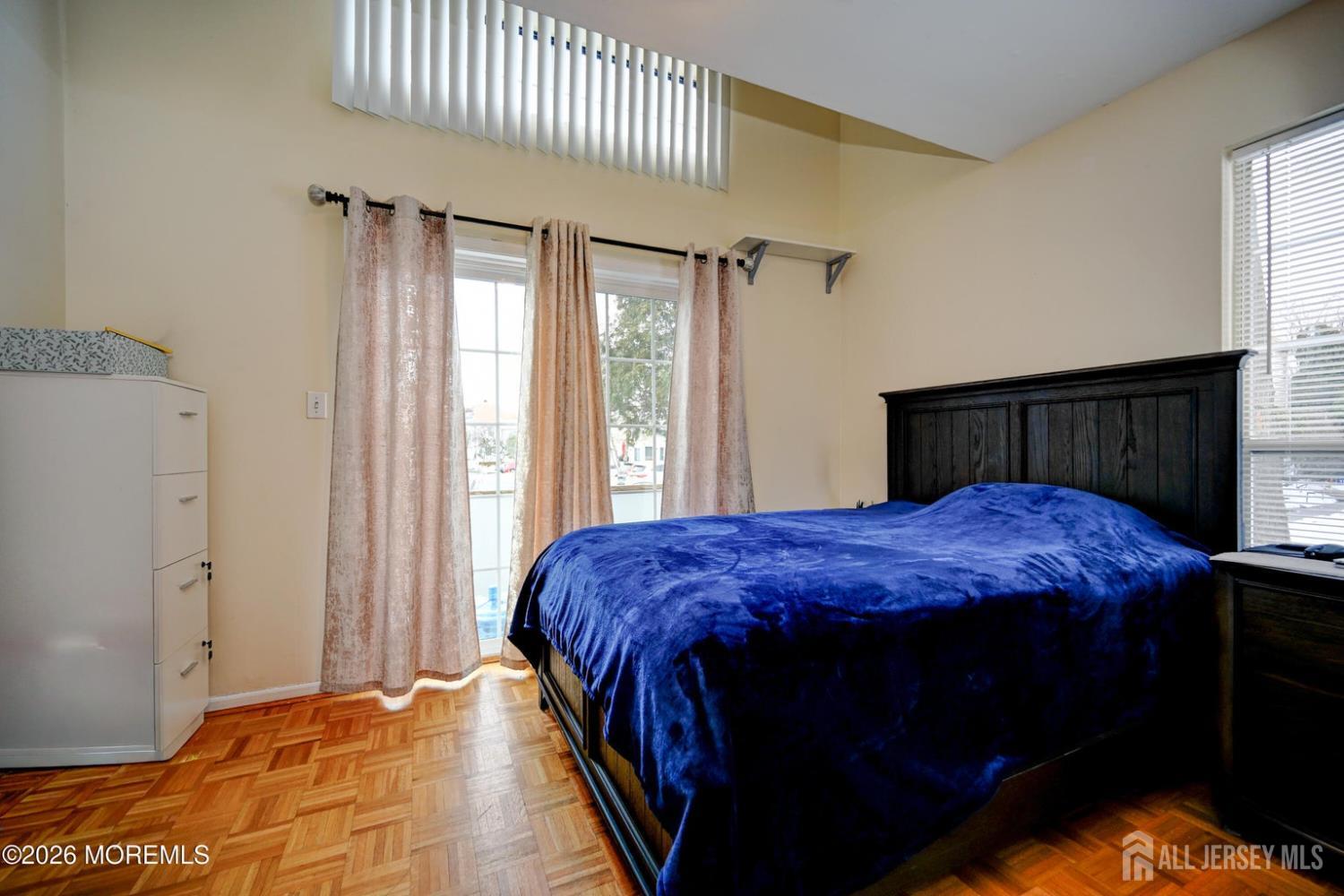 22 Borell Square Parlin, NJ 08859 - Photo 12 of 32 a bed sitting in a bedroom next to a window