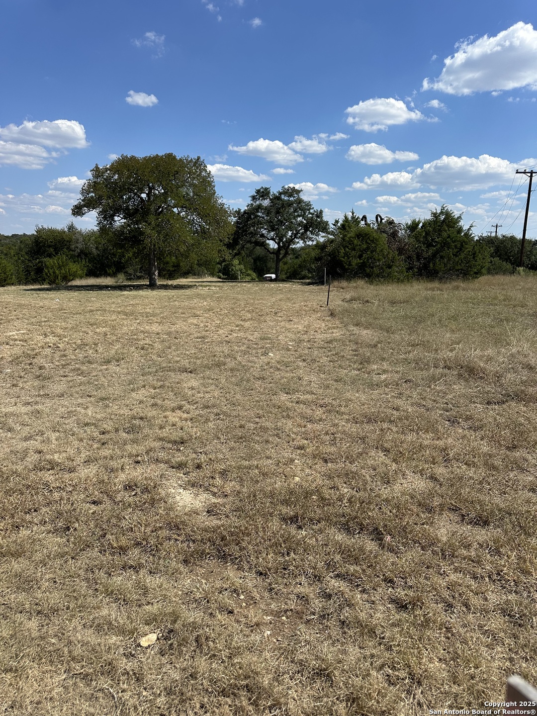 103 Albert Horton Blanco, TX 78606 - Photo 7 of 14 a view of lake with sunset