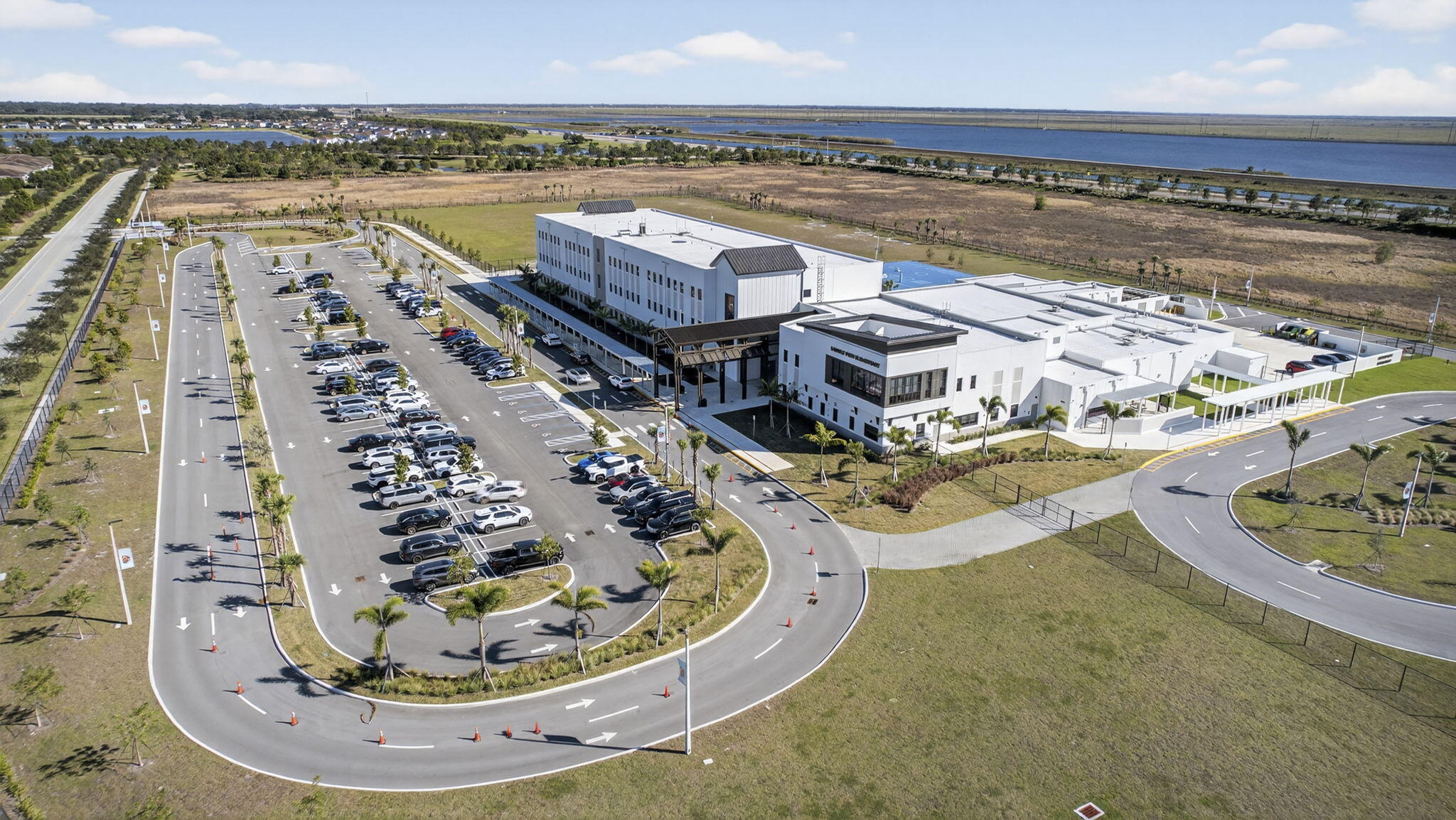 1055 Ember Ridge Run Loxahatchee, FL 33470 - Photo 101 of 103 a view of a swimming pool and an ocean view