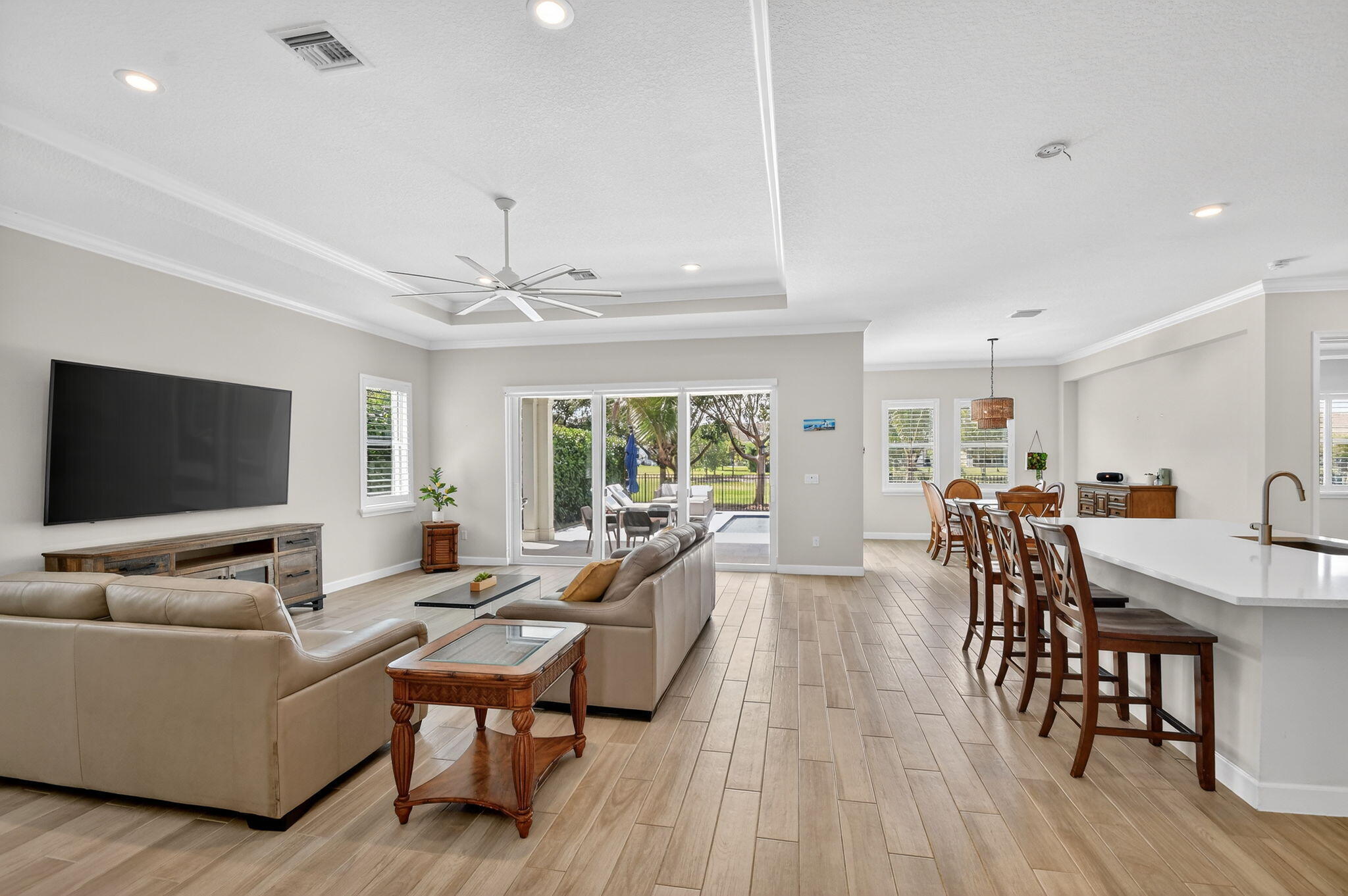 1055 Ember Ridge Run Loxahatchee, FL 33470 - Photo 13 of 103 a living room with furniture and a flat screen tv