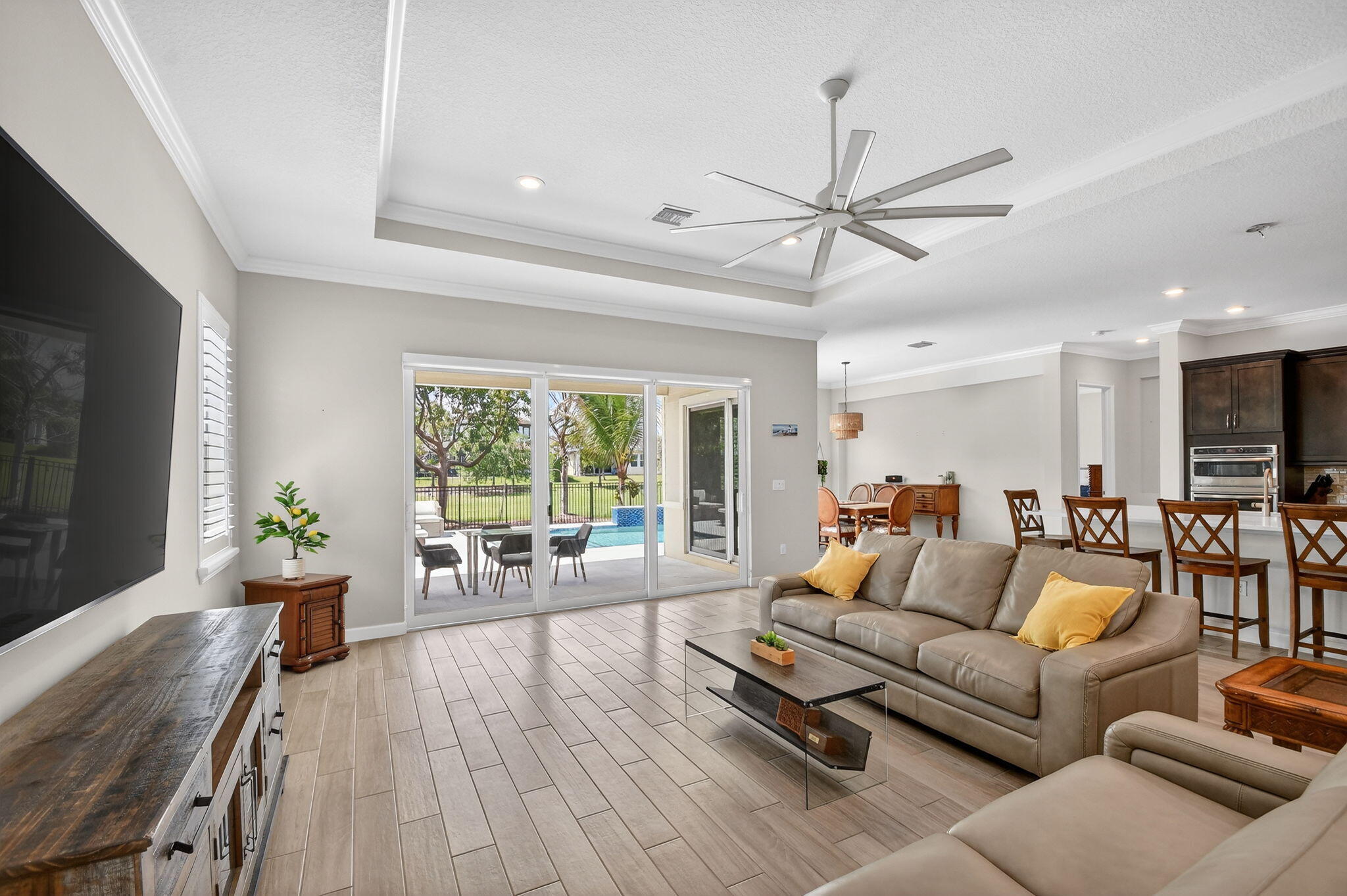 1055 Ember Ridge Run Loxahatchee, FL 33470 - Photo 16 of 103 a living room with furniture and a flat screen tv