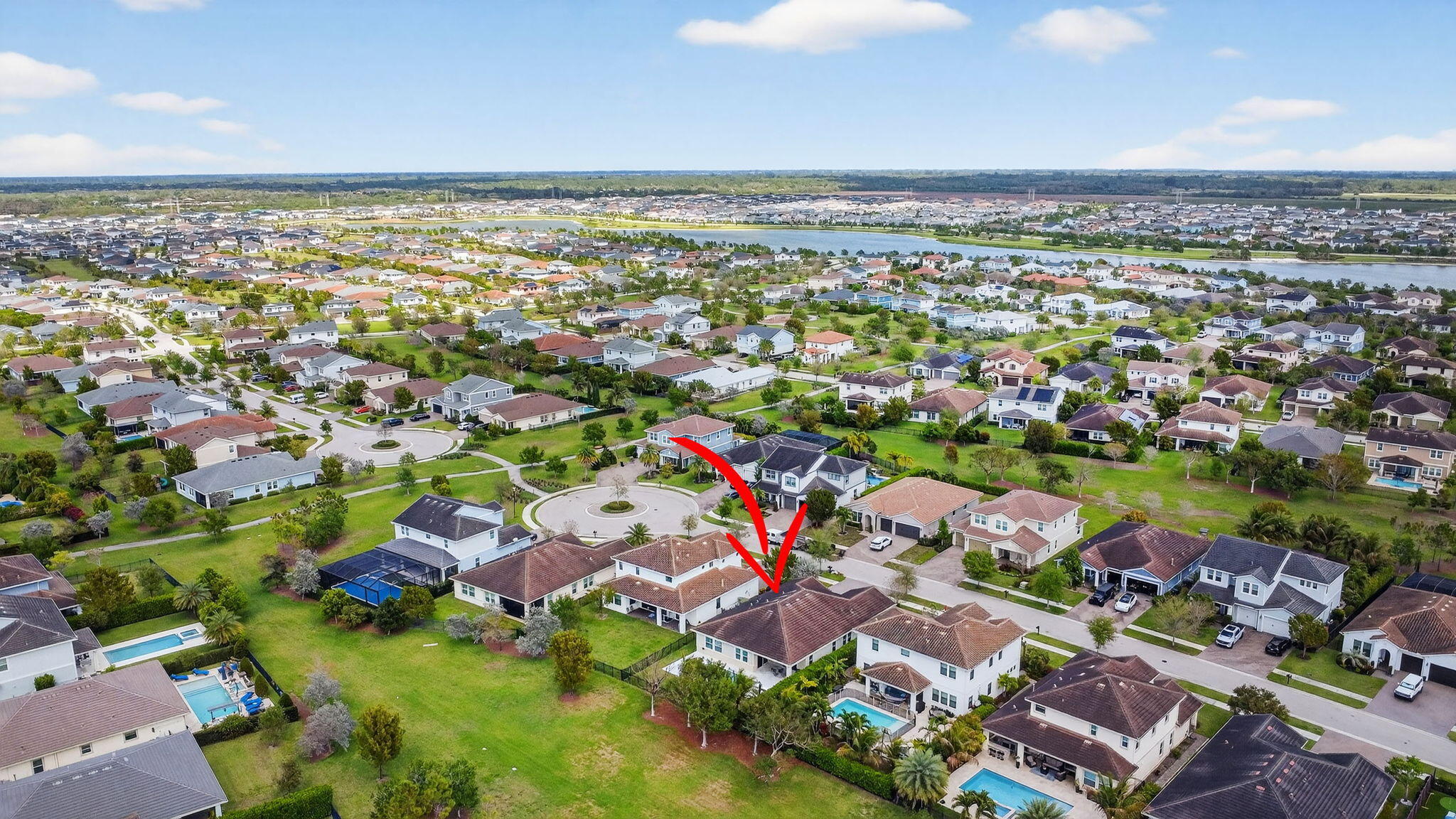 1055 Ember Ridge Run Loxahatchee, FL 33470 - Photo 66 of 103 an aerial view of multiple house