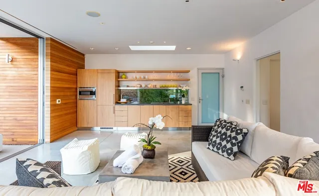 a living room with patio area