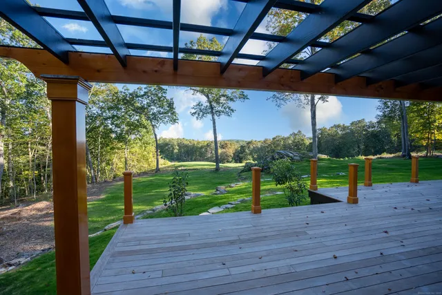 a view of a porch with a yard