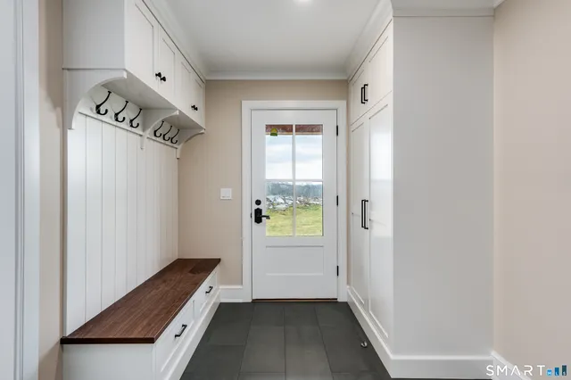 a view of an empty room with a window