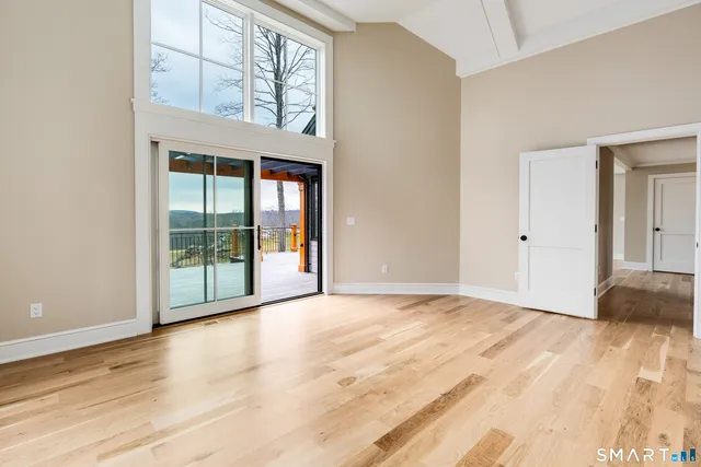 a front view of a house with a yard table and chairs
