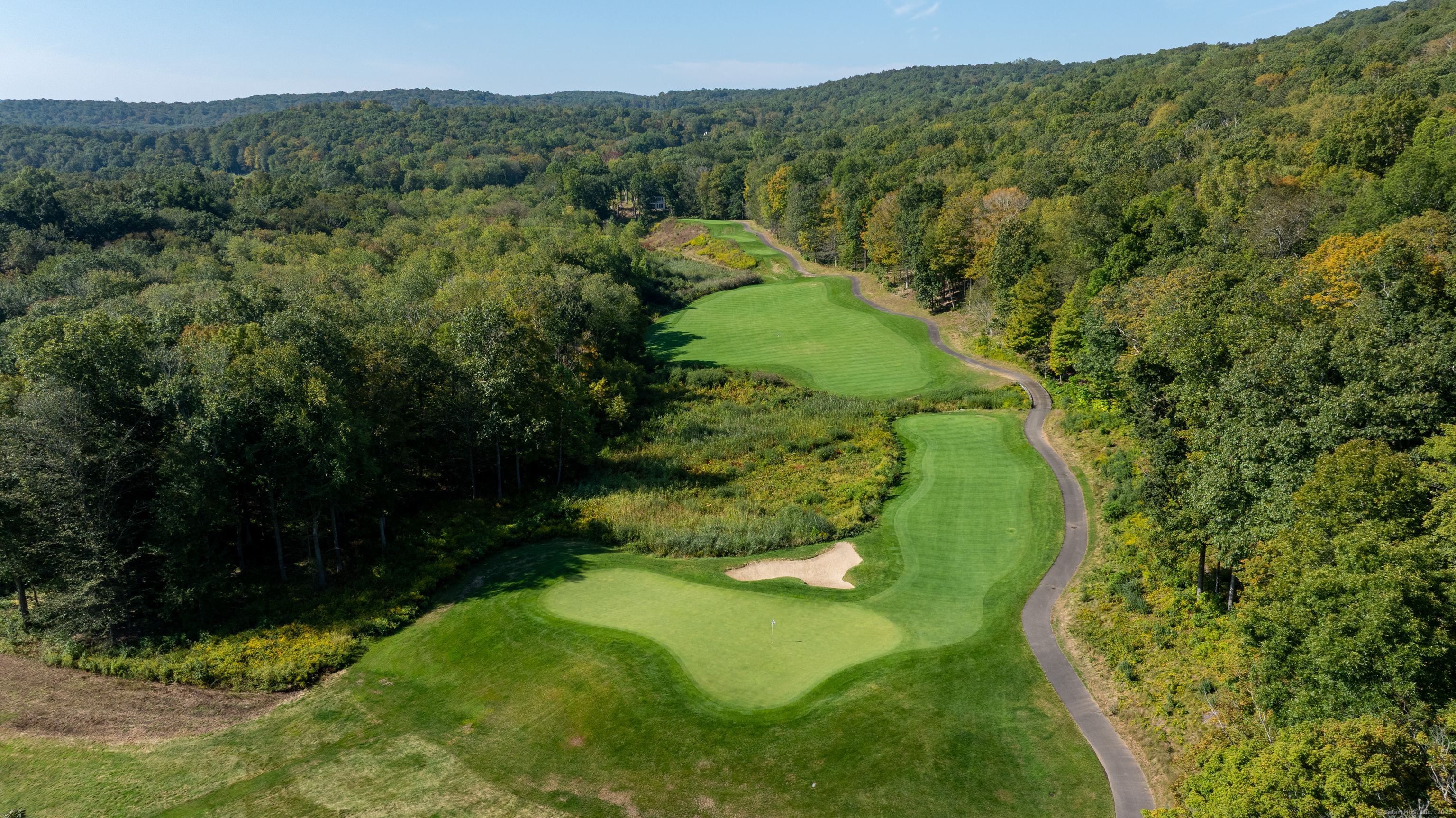 703 Fox Hopyard Road East Haddam, CT 06423 - Photo 19 of 38 a view of a lake with a mountain in the back
