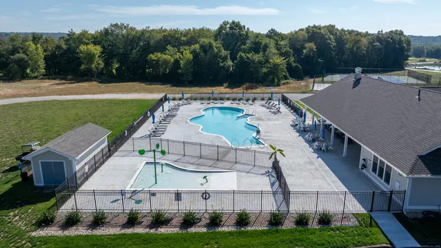 a view of house with garden space and street view