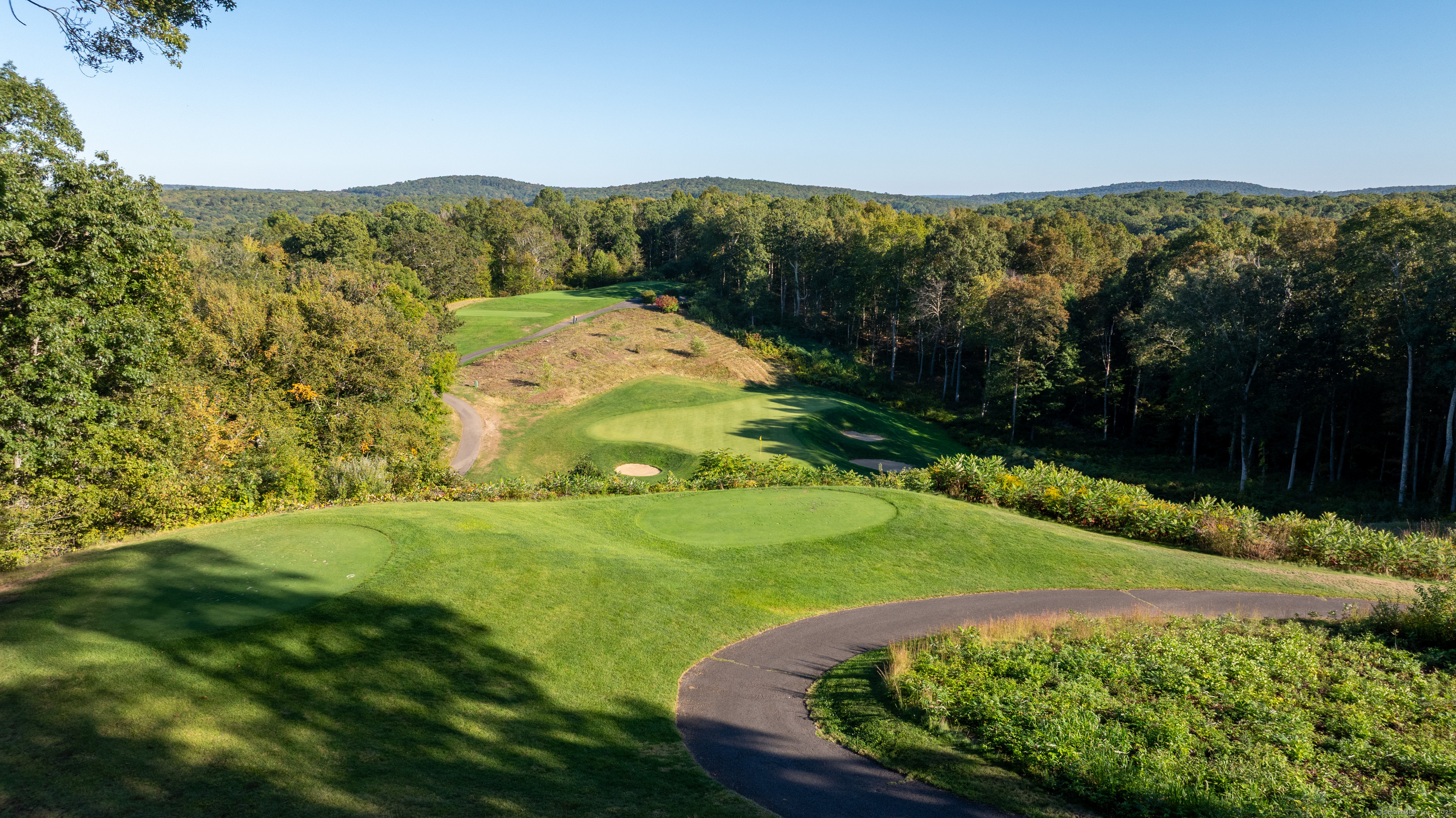 703 Fox Hopyard Road East Haddam, CT 06423 - Photo 27 of 38 a view of a grassy area with an ocean