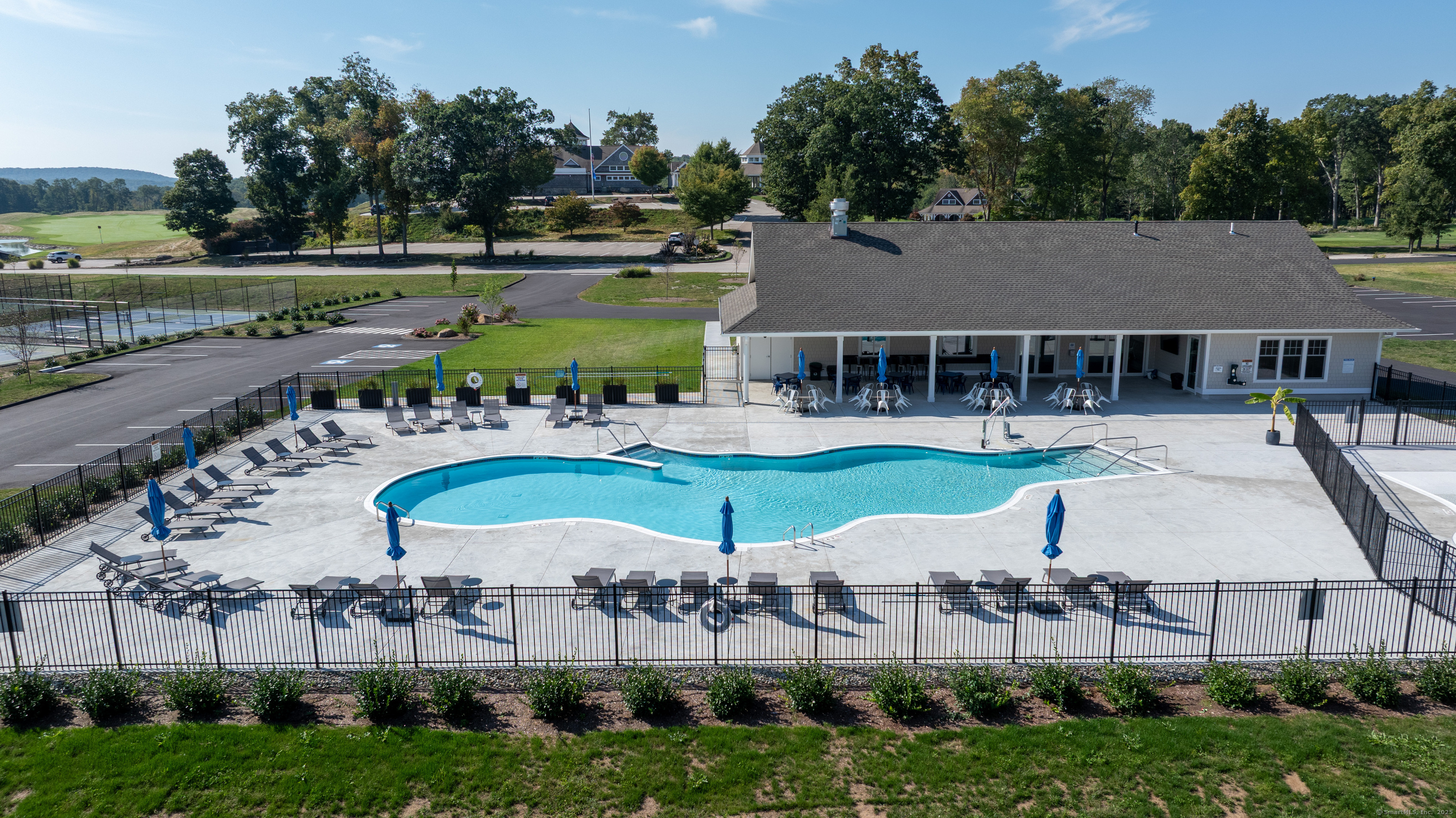703 Fox Hopyard Road East Haddam, CT 06423 - Photo 29 of 38 a swimming pool with outdoor seating and yard