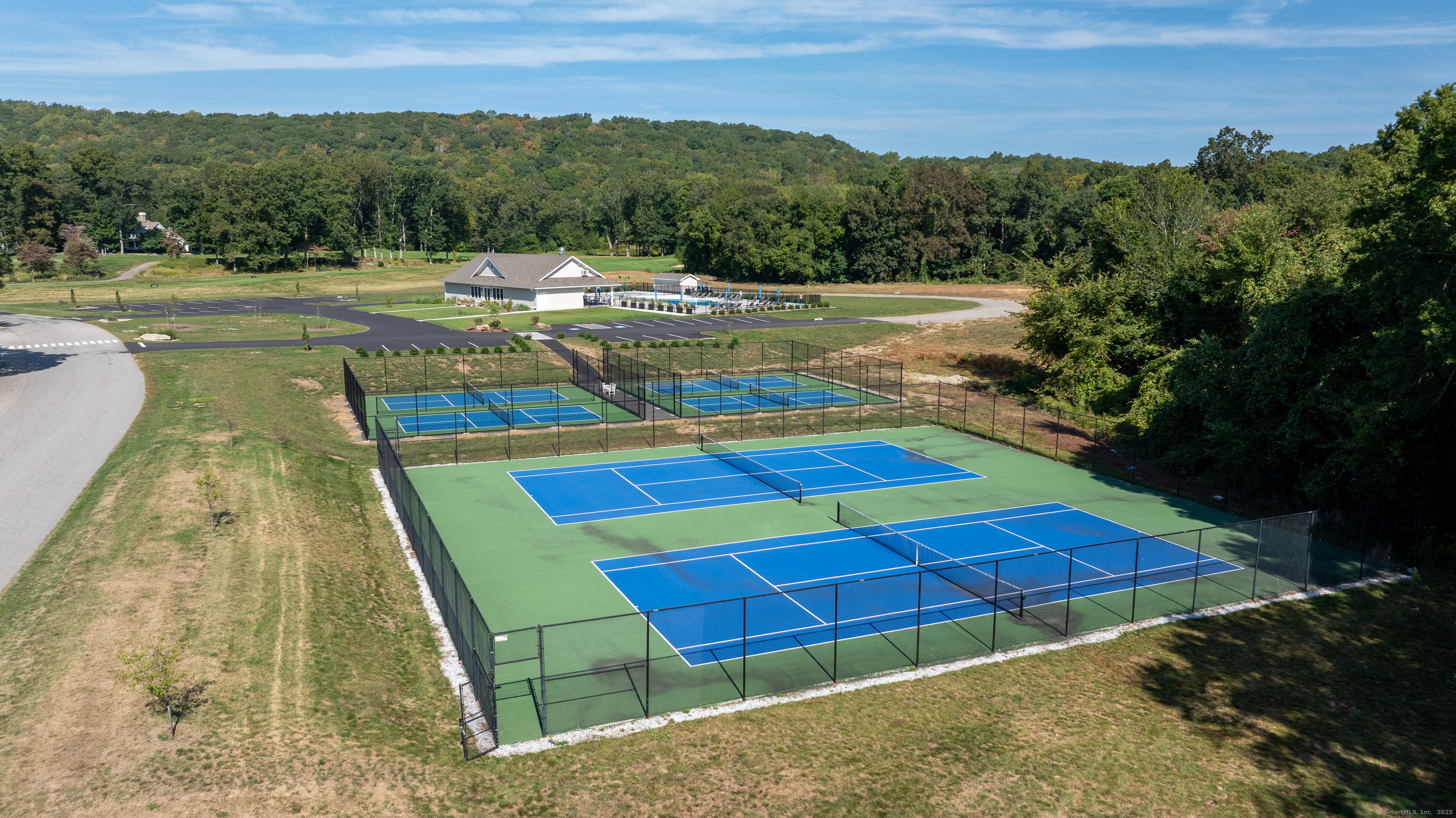 703 Fox Hopyard Road East Haddam, CT 06423 - Photo 32 of 38 a view of swimming pool with outdoor seating and yard in back