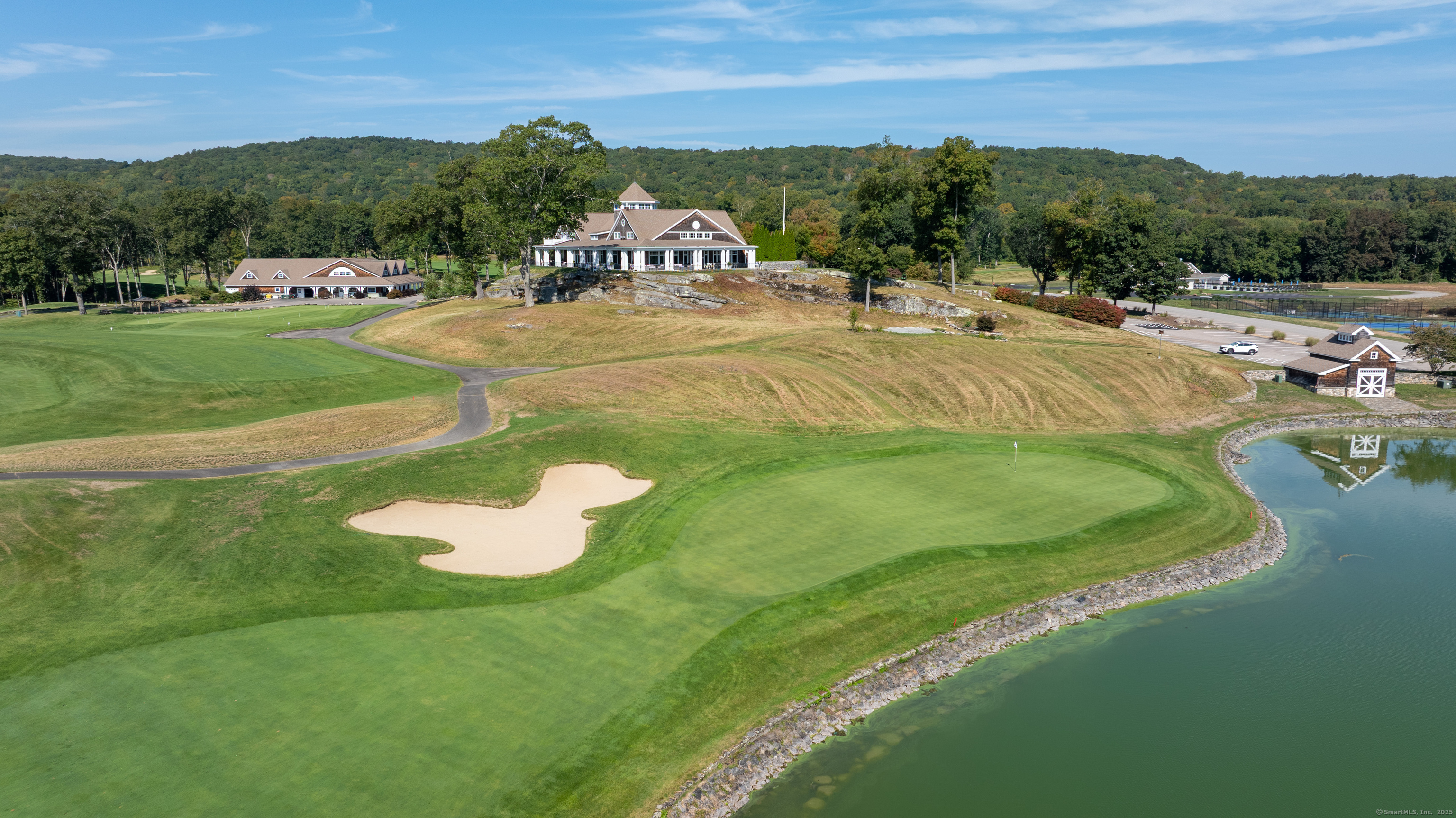 703 Fox Hopyard Road East Haddam, CT 06423 - Photo 33 of 38 a view of a swimming pool with a yard