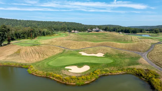 a view of a lake with a yard