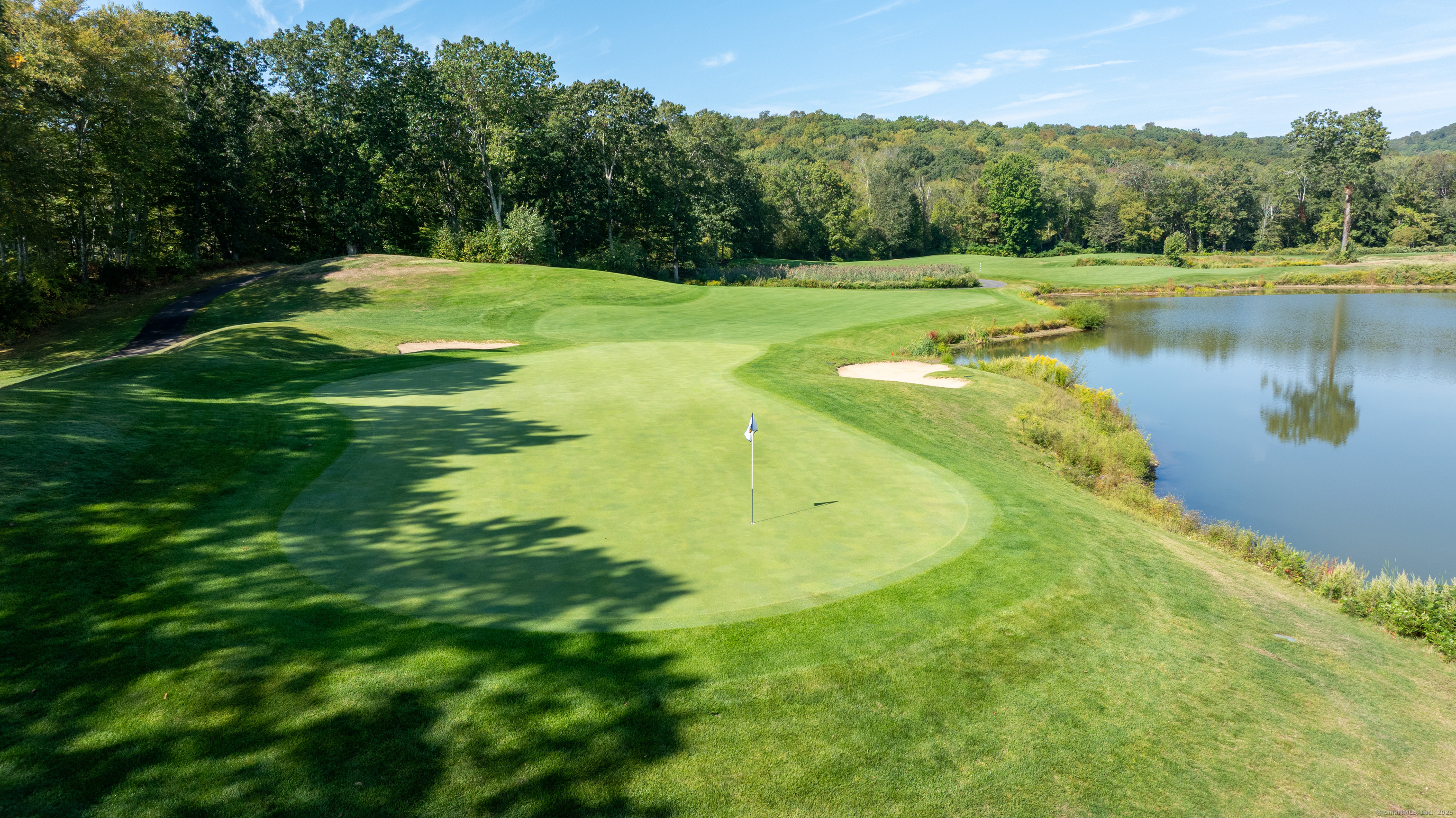 703 Fox Hopyard Road East Haddam, CT 06423 - Photo 37 of 38 a view of a swimming pool with a lake view
