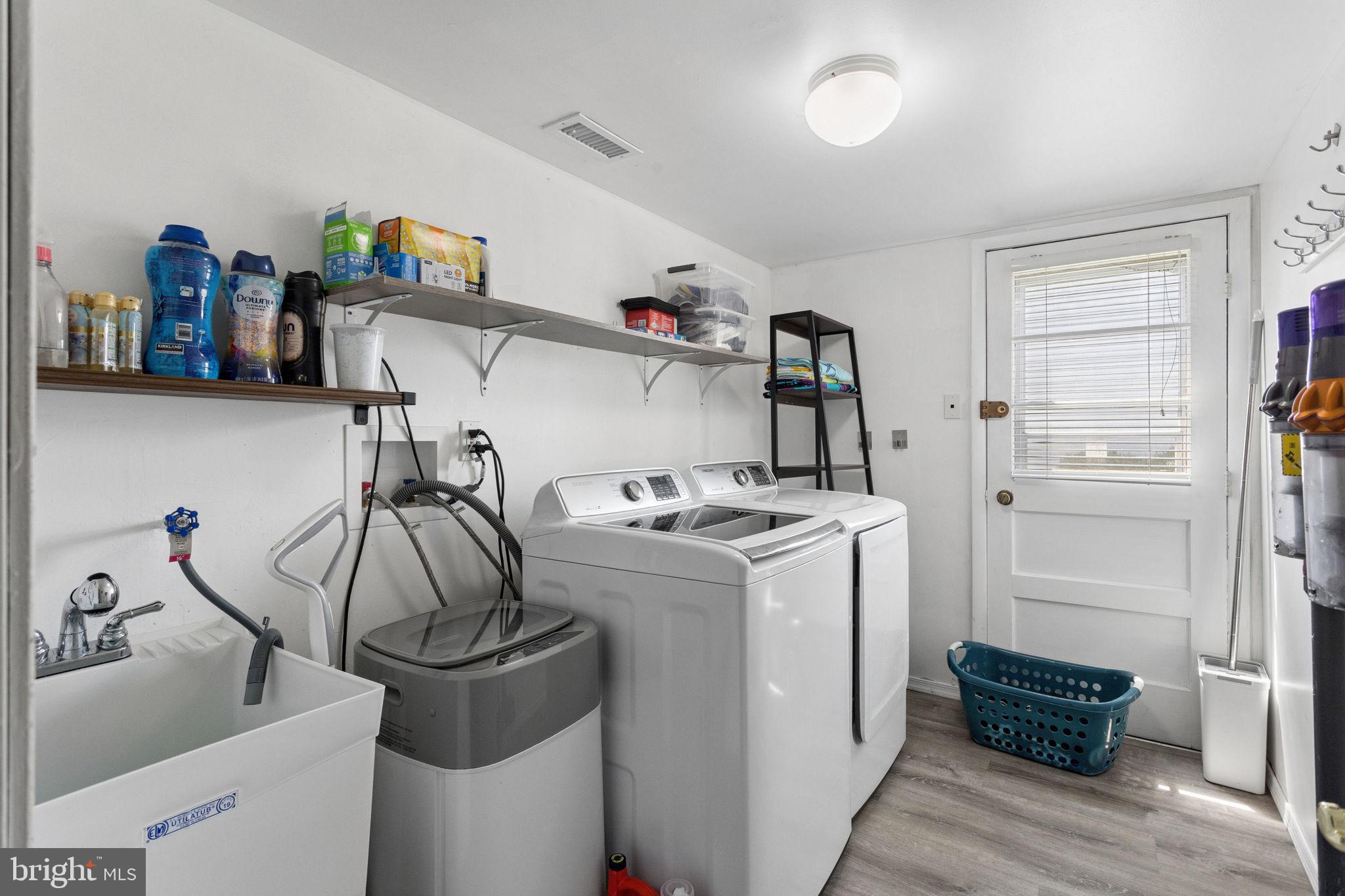 252 Sandringham Road Cherry Hill, NJ 08003 - Photo 24 of 31 a storage room with washer and dryer