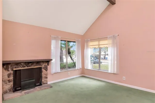 a view of an entryway with a kitchen
