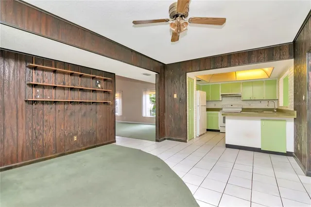 a view of an empty room with a large window