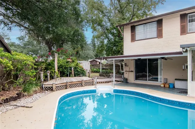 a house with trees in the background