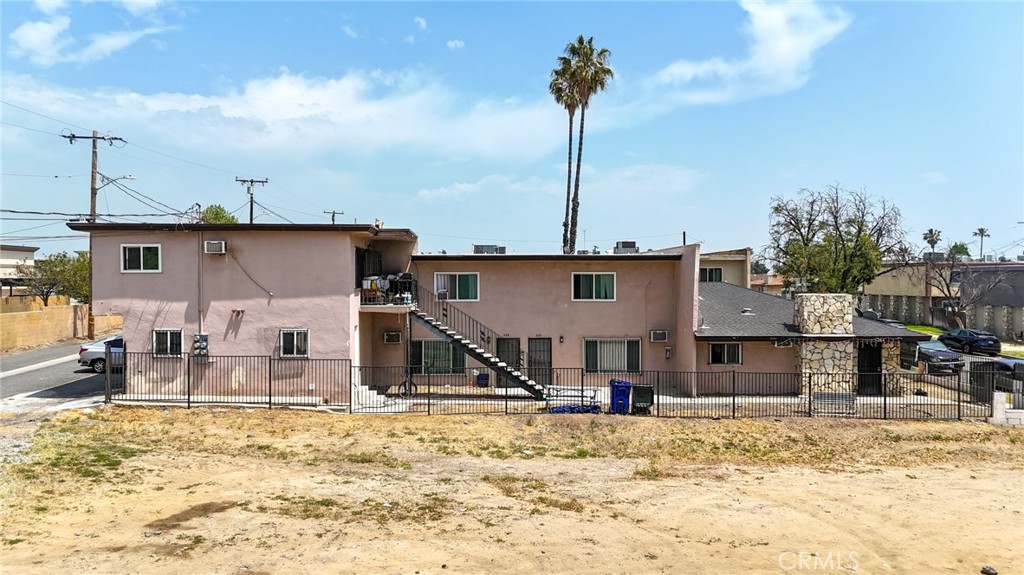 264 West Jackson Street Rialto, CA 92376 - Photo 2 of 32 a view of a house with a yard covered with snow