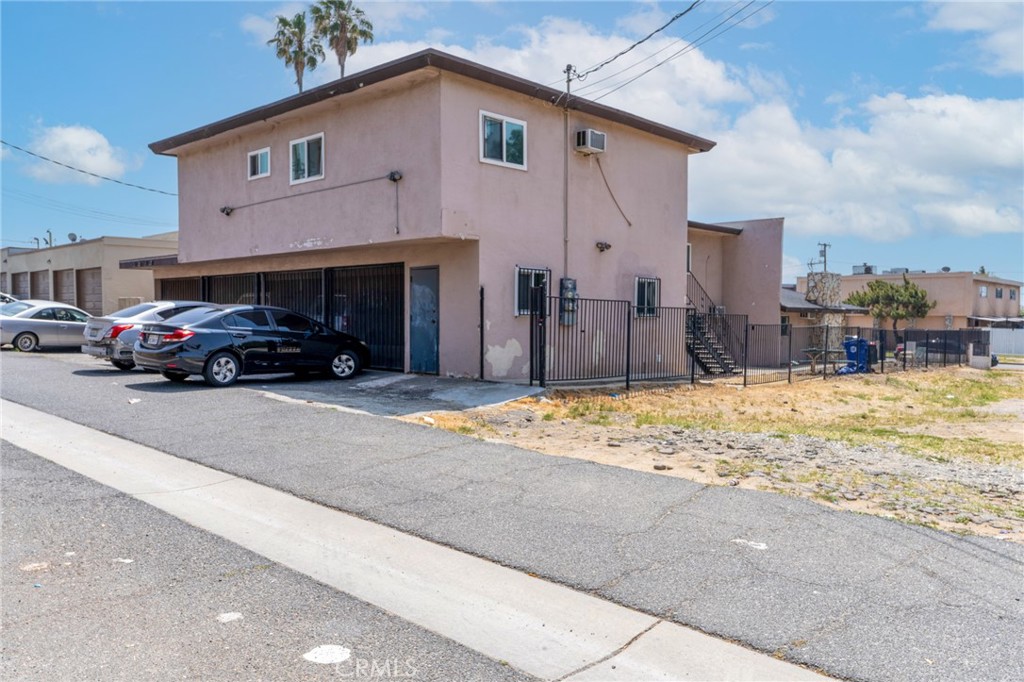 264 West Jackson Street Rialto, CA 92376 - Photo 30 of 32 a view of a car park in front of house
