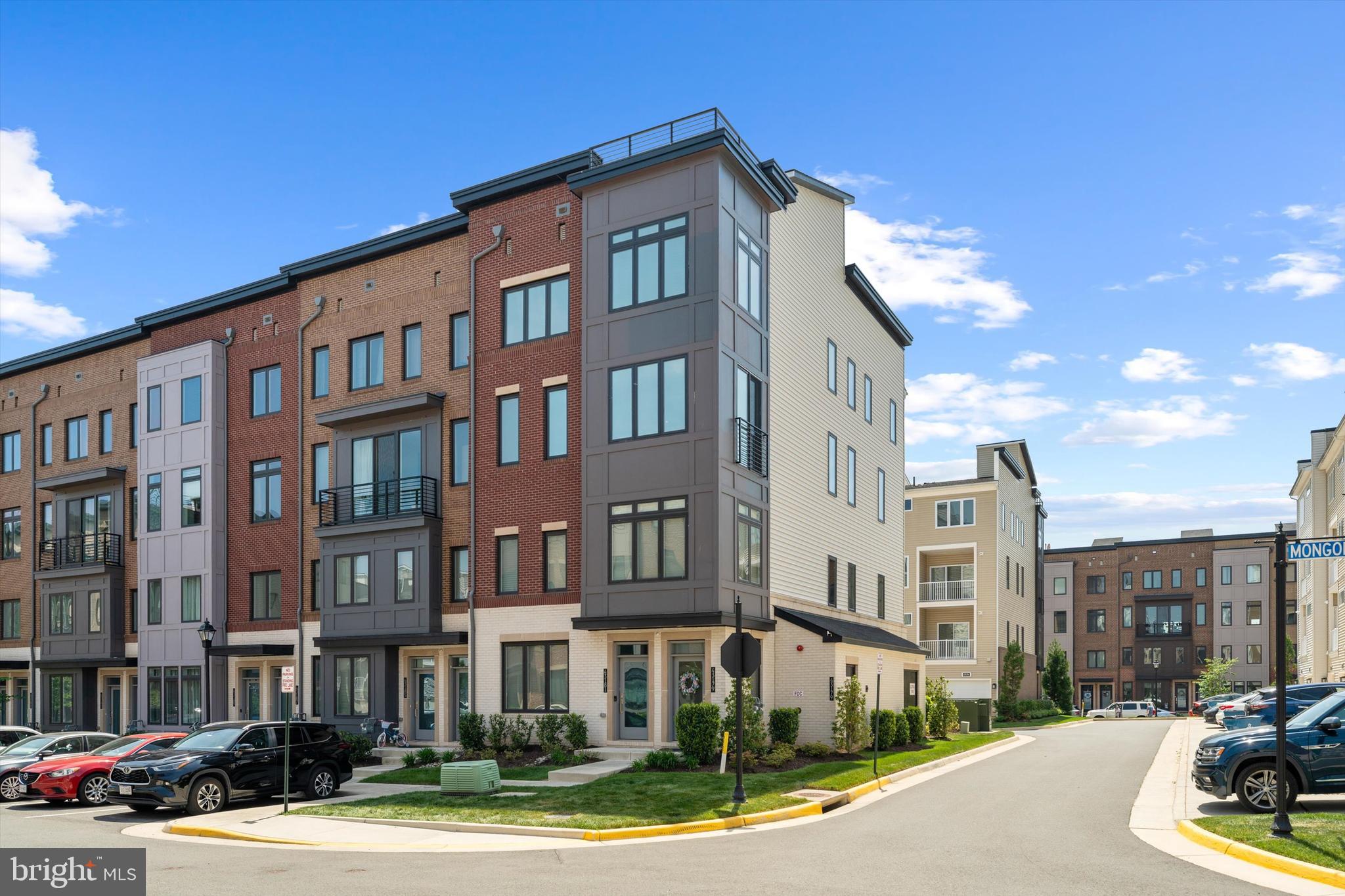 43179 Mongold Square Ashburn, VA 20148 - Photo 2 of 46 a front view of a multi story building