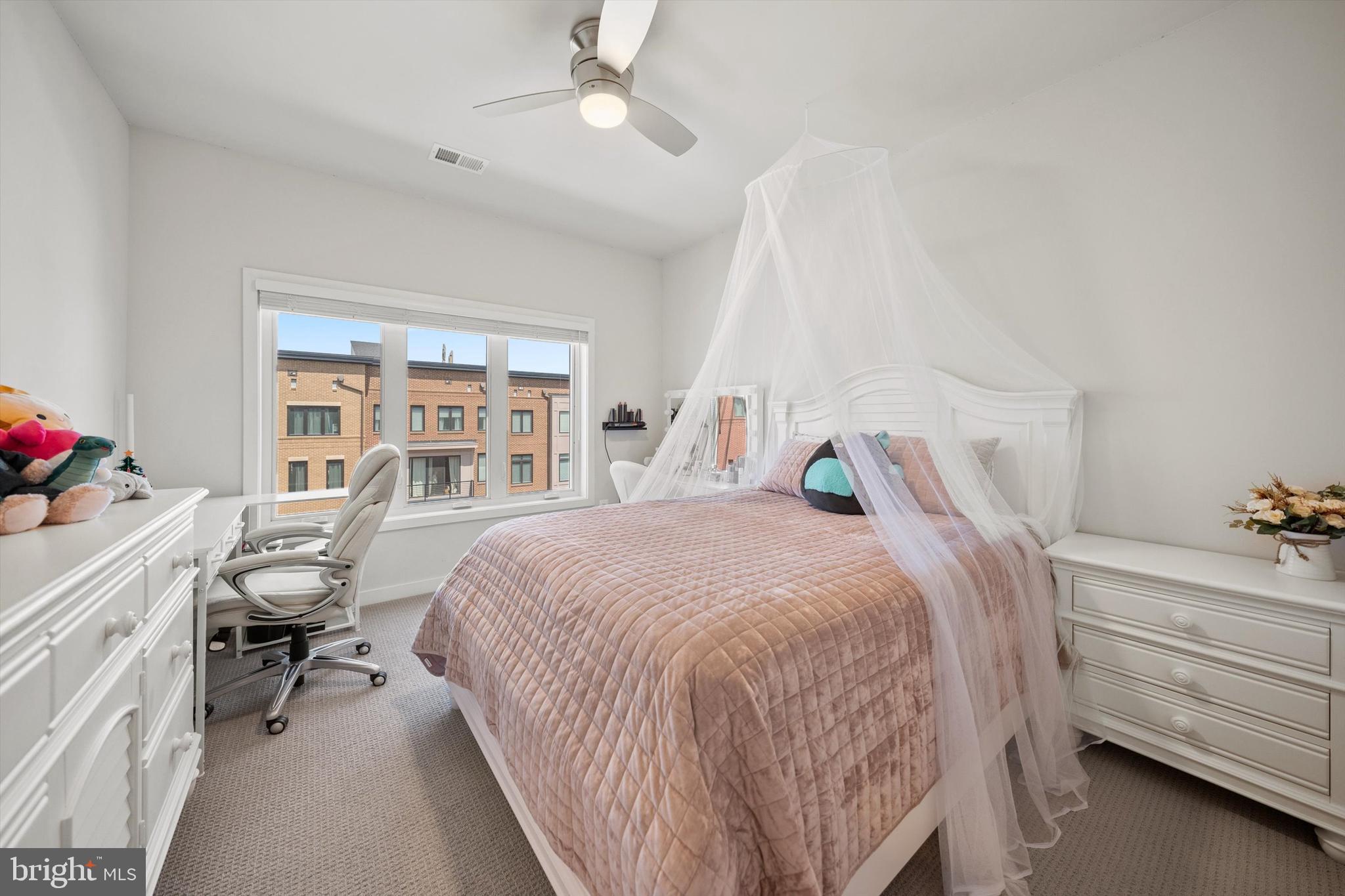 43179 Mongold Square Ashburn, VA 20148 - Photo 23 of 46 a bed room with a bed and a chair