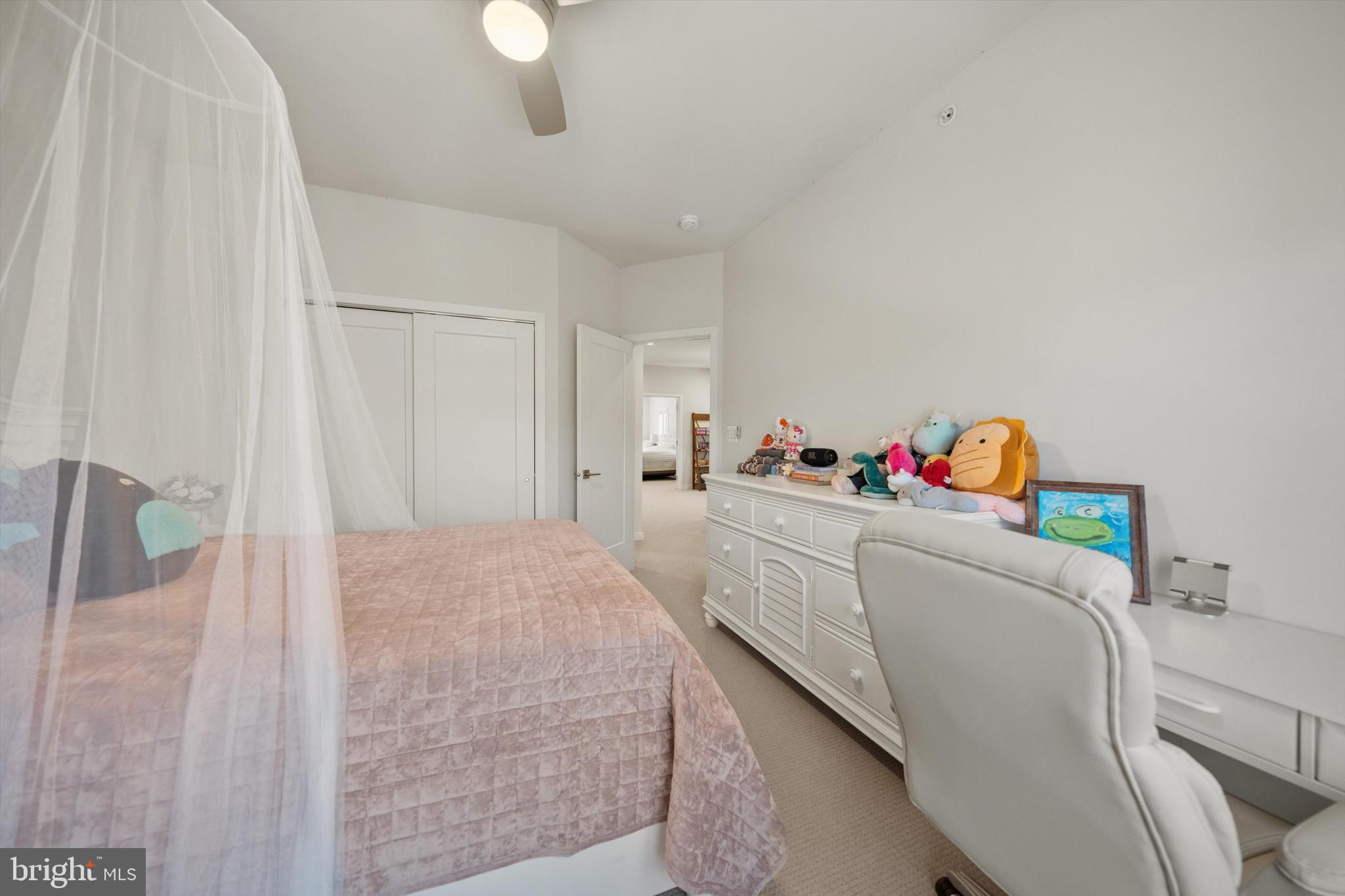 43179 Mongold Square Ashburn, VA 20148 - Photo 24 of 46 a bedroom with a bed and a cabinets