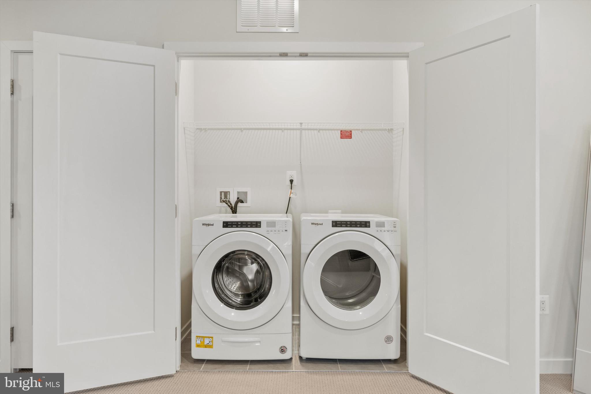 43179 Mongold Square Ashburn, VA 20148 - Photo 29 of 46 a utility room with dryer and washer