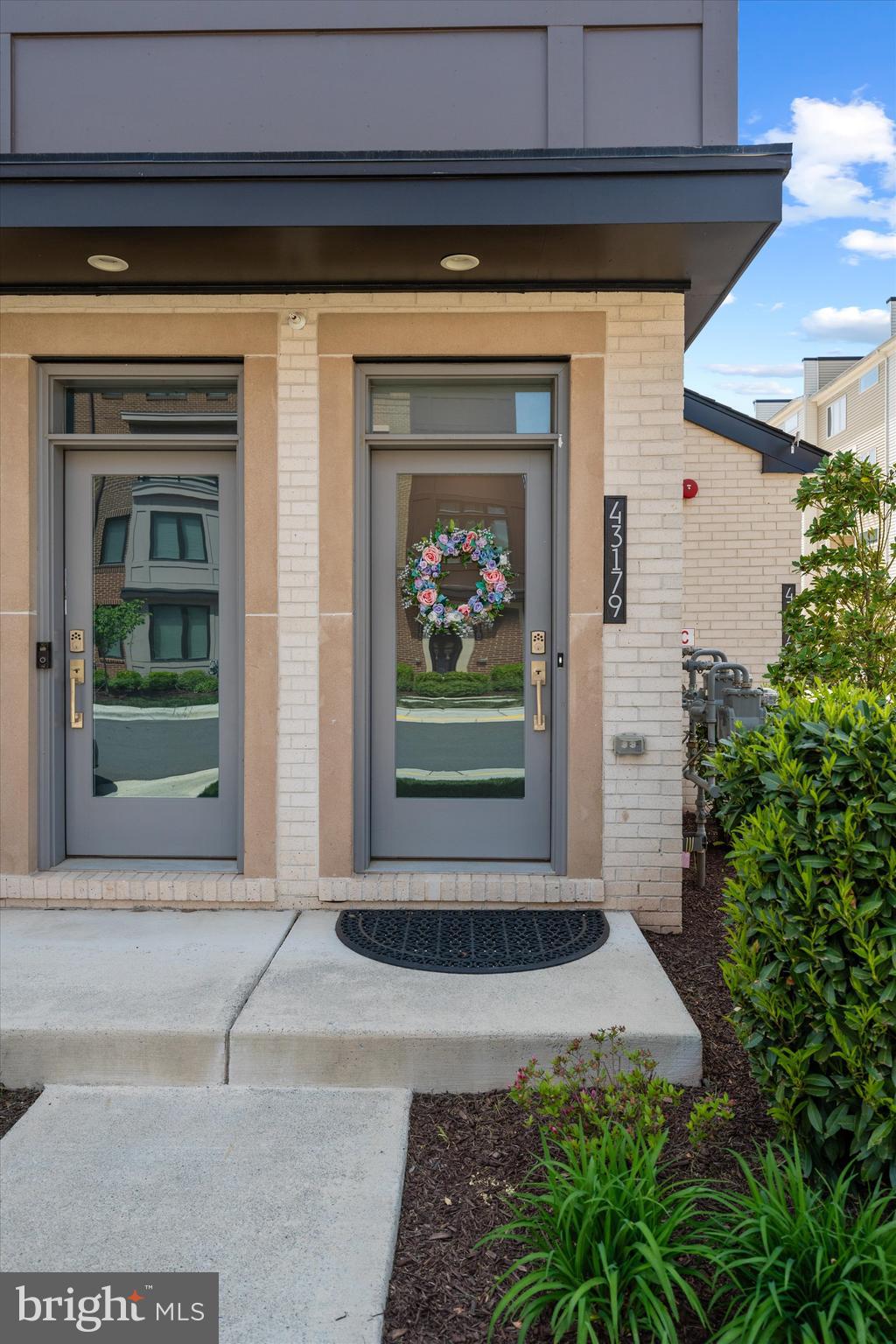 43179 Mongold Square Ashburn, VA 20148 - Photo 3 of 46 a view of entrance door of the house
