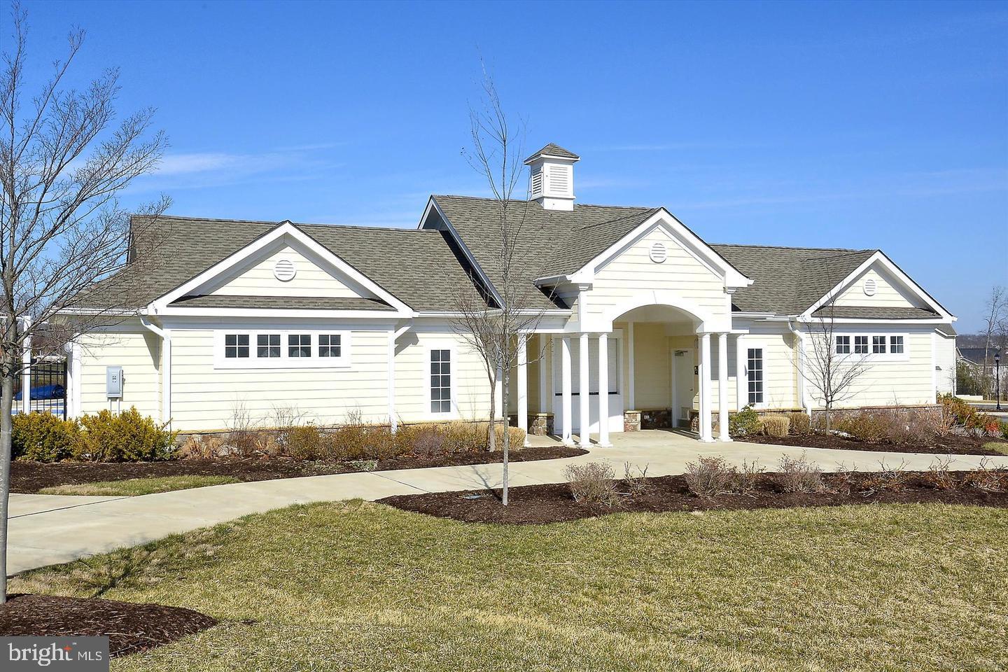 43179 Mongold Square Ashburn, VA 20148 - Photo 37 of 46 a front view of a house with a yard