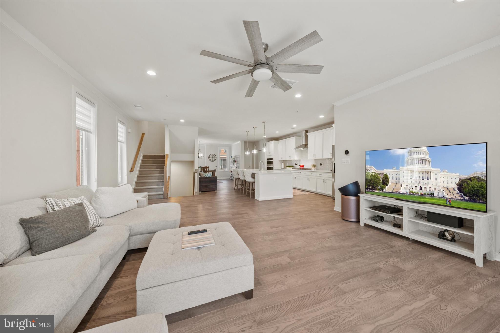 43179 Mongold Square Ashburn, VA 20148 - Photo 8 of 46 a living room with furniture and kitchen view