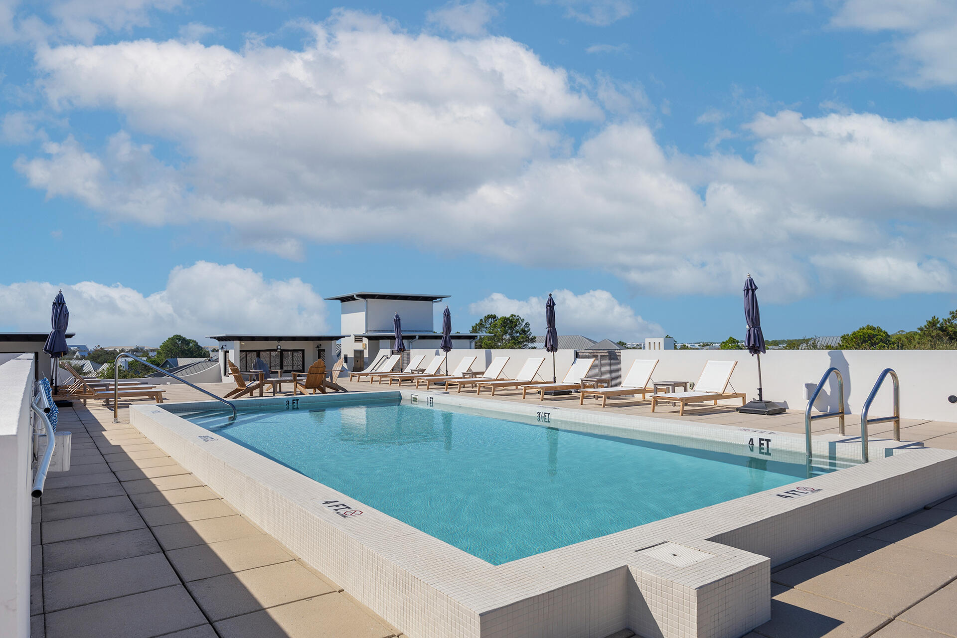 136 Georgetown Avenue, Unit E36 Inlet Beach, FL 32461 - Photo 27 of 54 a view of a swimming pool from a balcony