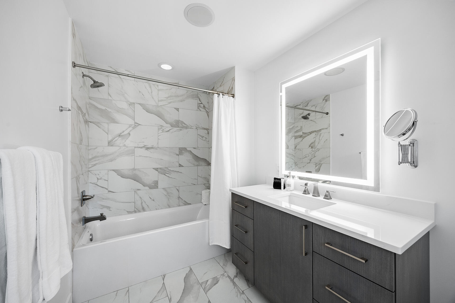 136 Georgetown Avenue, Unit E36 Inlet Beach, FL 32461 - Photo 36 of 54 a bathroom with a bathtub sink vanity and mirror