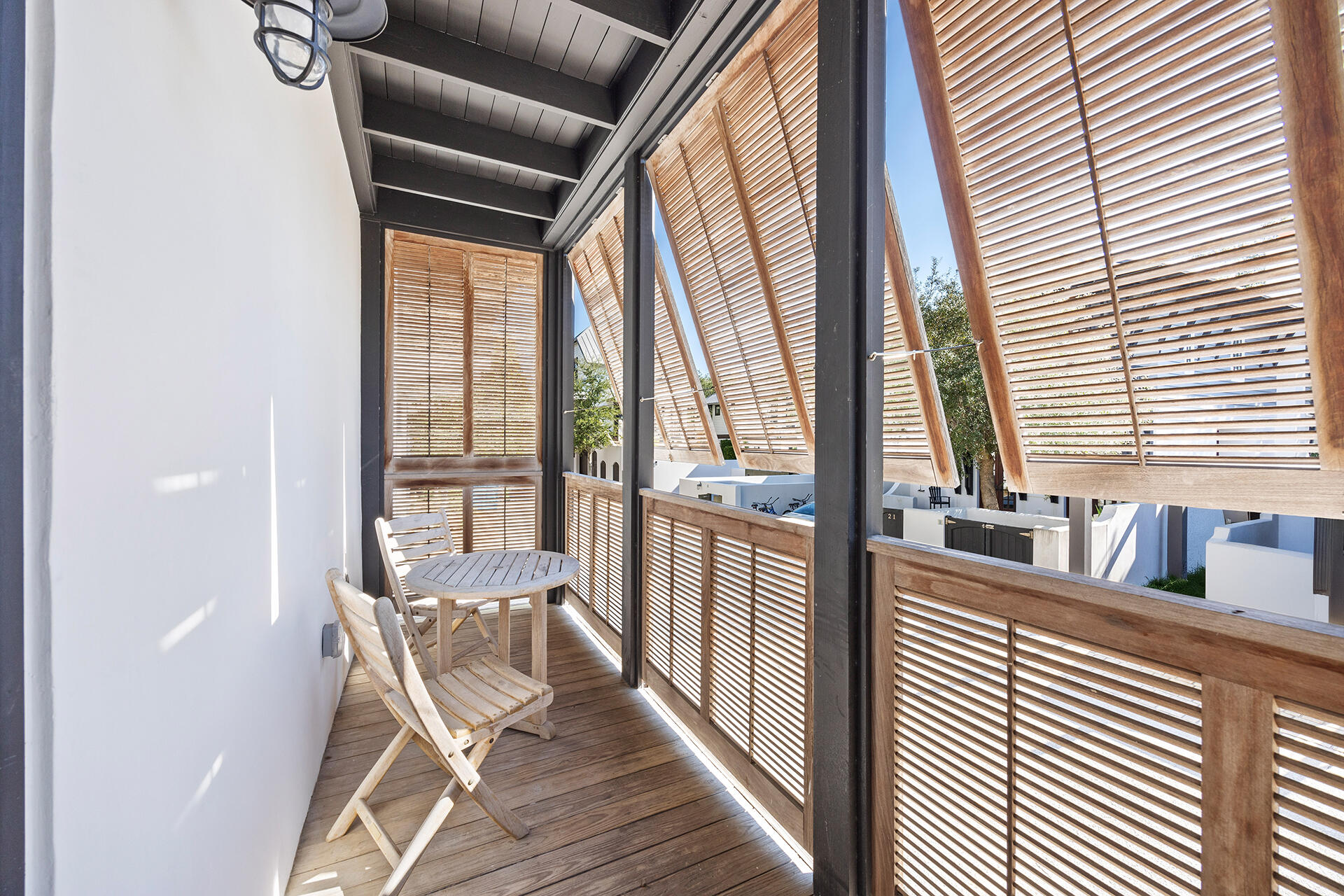 136 Georgetown Avenue, Unit E36 Inlet Beach, FL 32461 - Photo 50 of 55 a view of a balcony with chairs