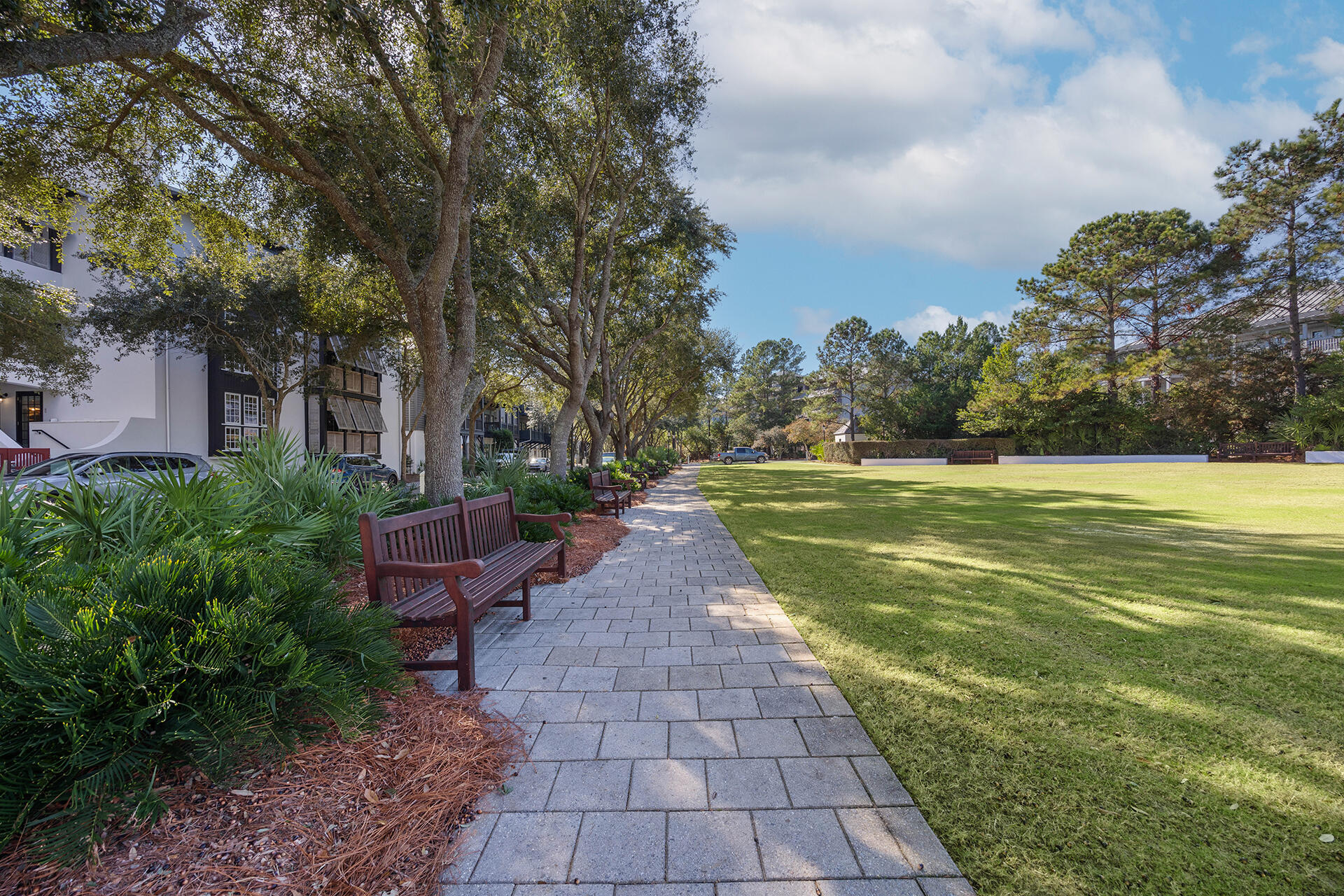 136 Georgetown Avenue, Unit E36 Inlet Beach, FL 32461 - Photo 5 of 55 a view of a garden with lawn chairs
