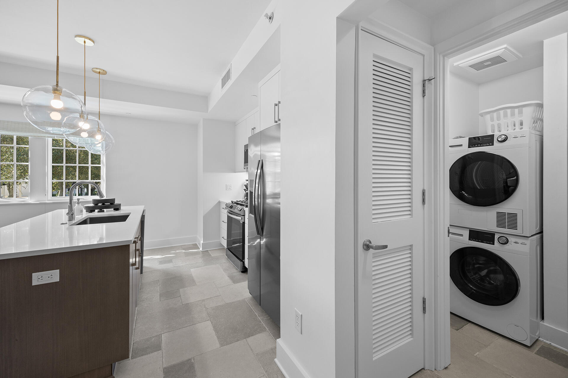 136 Georgetown Avenue, Unit E36 Inlet Beach, FL 32461 - Photo 53 of 54 a view of a hallway with washer and dryer