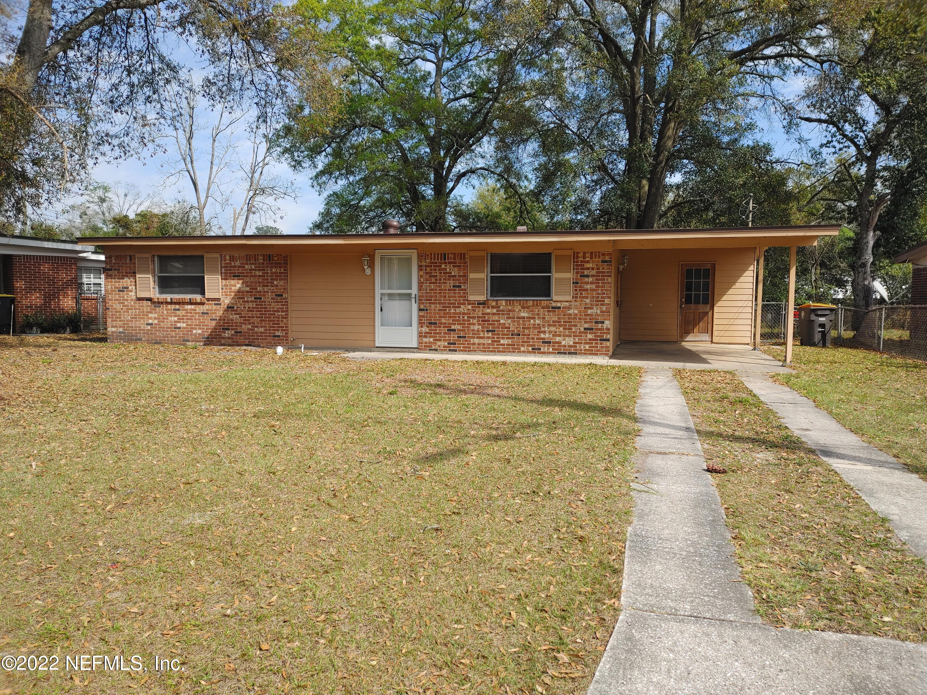 a house with trees in front of it
