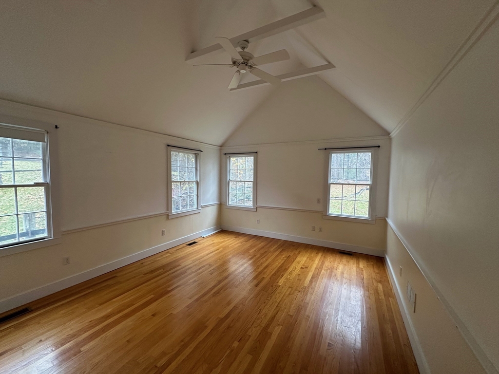 333 Dedham Street Dover, MA 02030 - Photo 15 of 24 a view of an empty room with wooden floor and a window