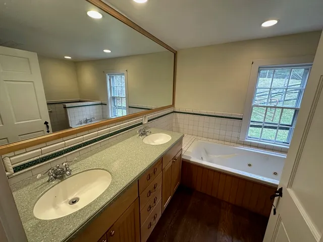 a bathroom with a sink and a bathtub