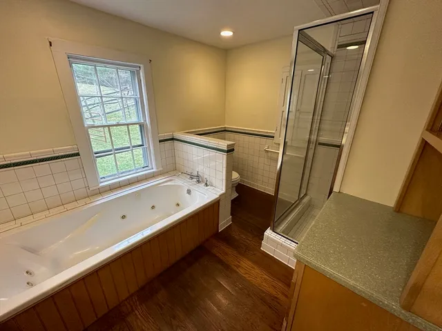 a bathroom with a bathtub and a sink
