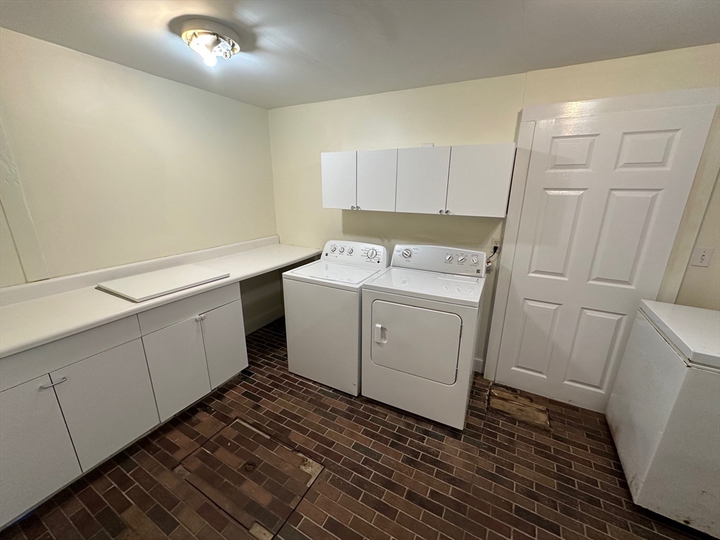 333 Dedham Street Dover, MA 02030 - Photo 23 of 24 a utility room with a sink a washer and dryer