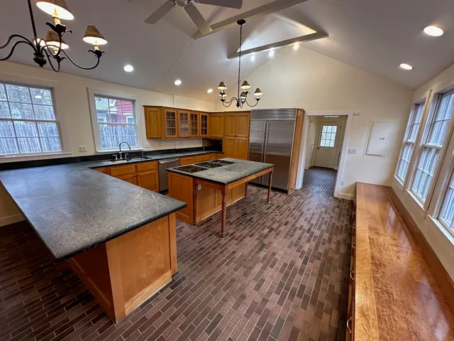 a room with furniture and wooden floor