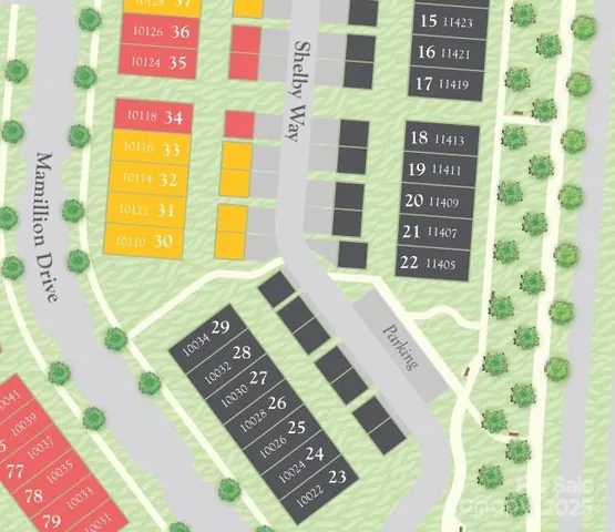 a view of a bedroom with a bed and a window