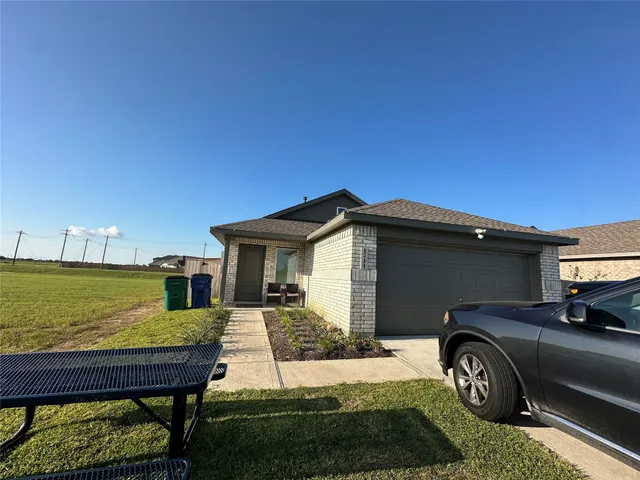 a car parked in front of a house