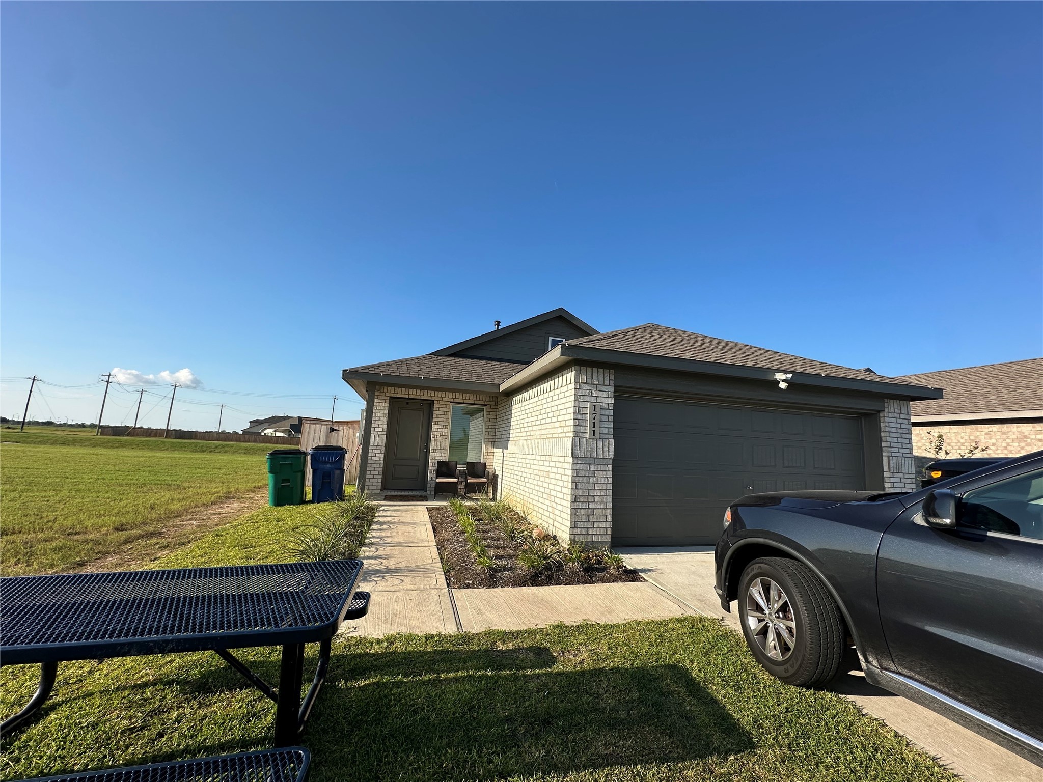 1723 Windrose Bend Angleton, TX 77515 - Photo 1 of 16 a car parked in front of a house
