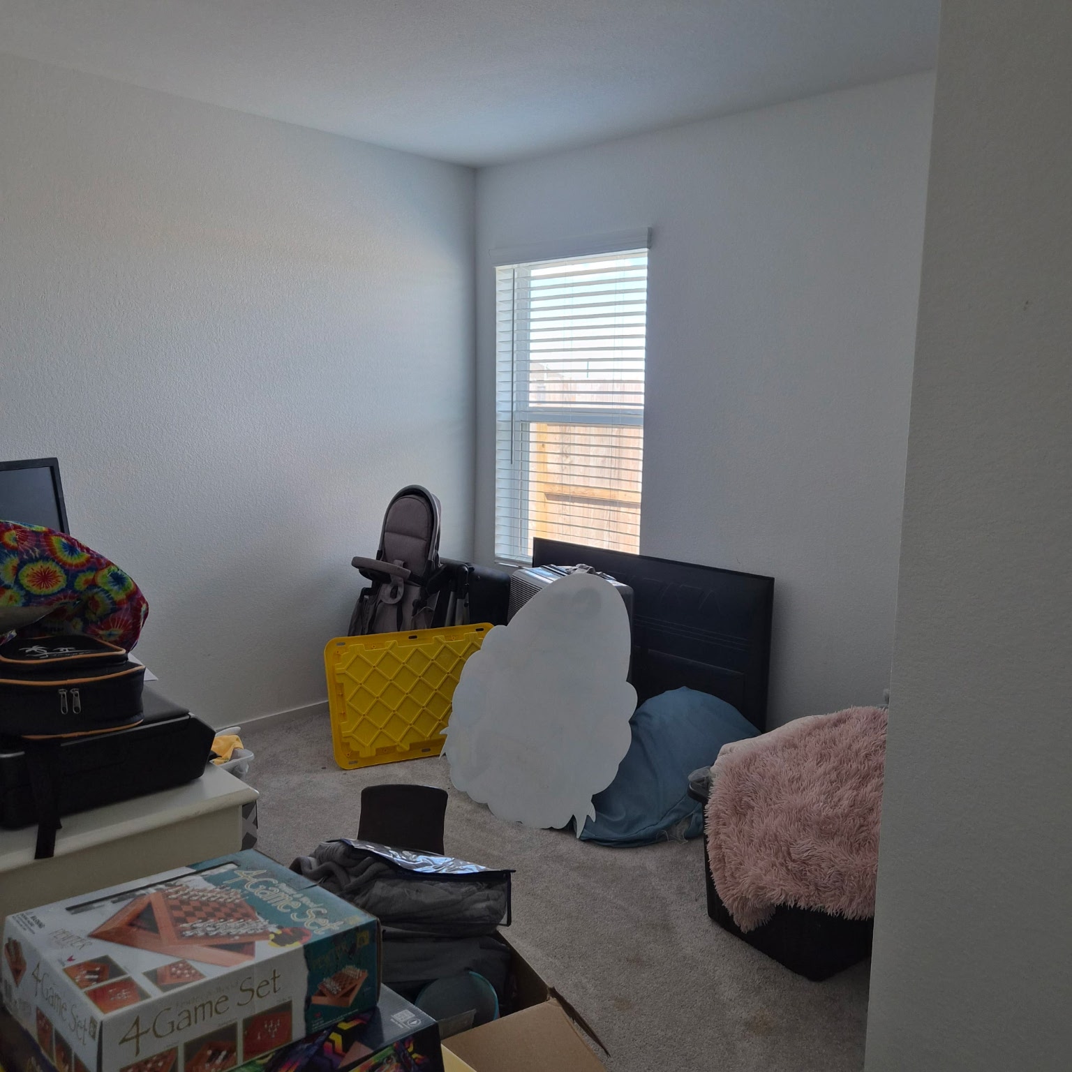 1723 Windrose Bend Angleton, TX 77515 - Photo 13 of 16 a living room with furniture and a window