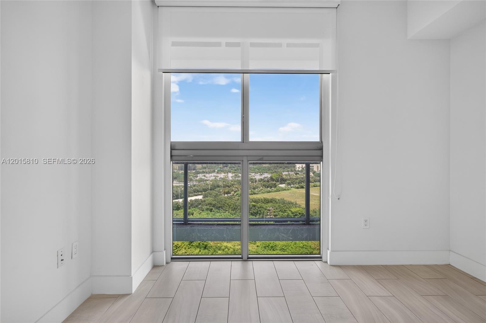 2000 Metropica Way, Unit 1902 Sunrise, FL 33323 - Photo 19 of 40 a view of a room with window