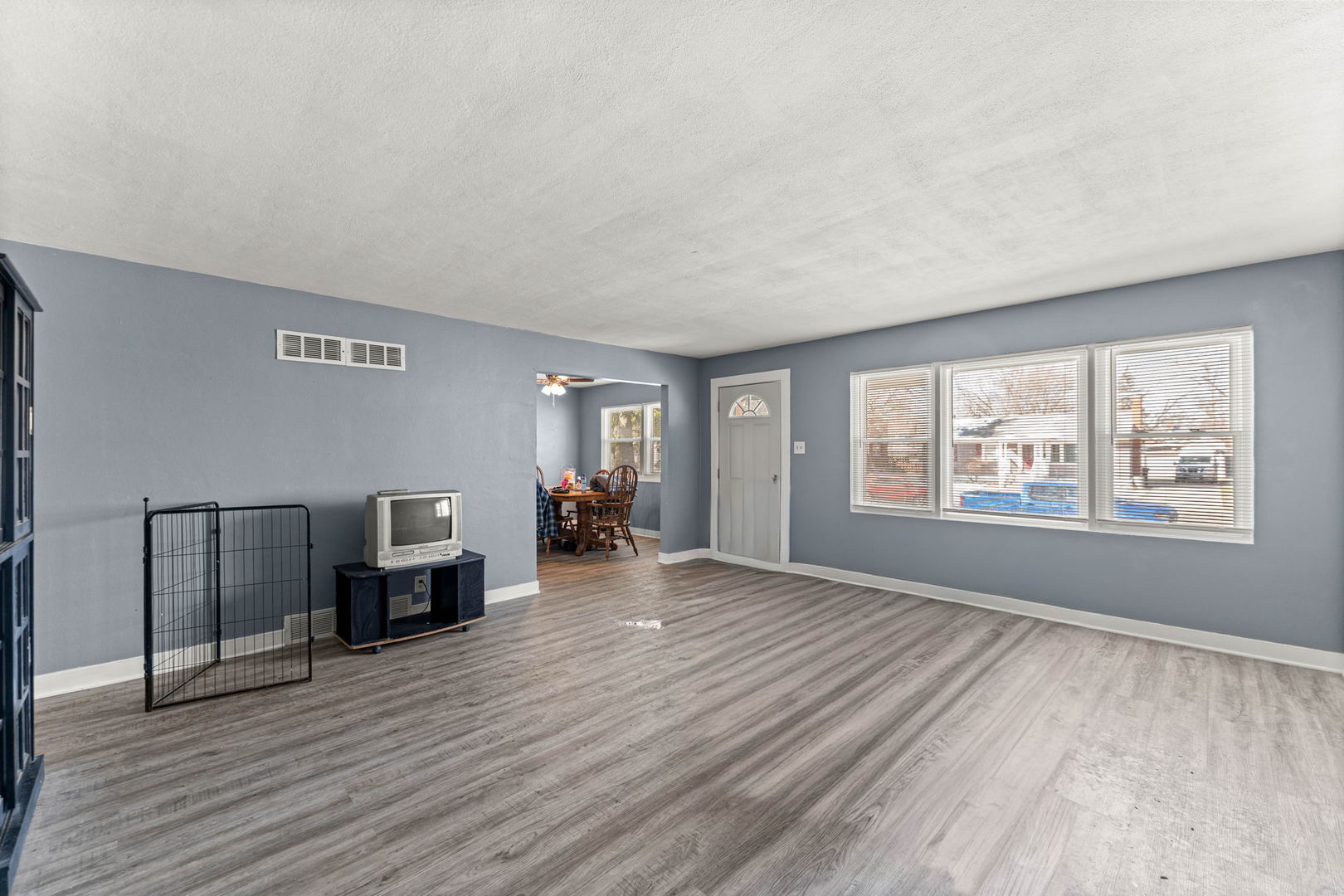 17831 Community Street Lansing, IL 60438 - Photo 5 of 22 a view of livingroom with furniture and wooden floor
