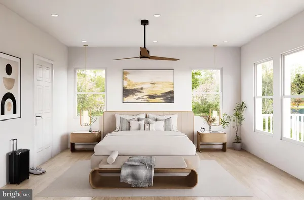 a bedroom with a bed and glass window